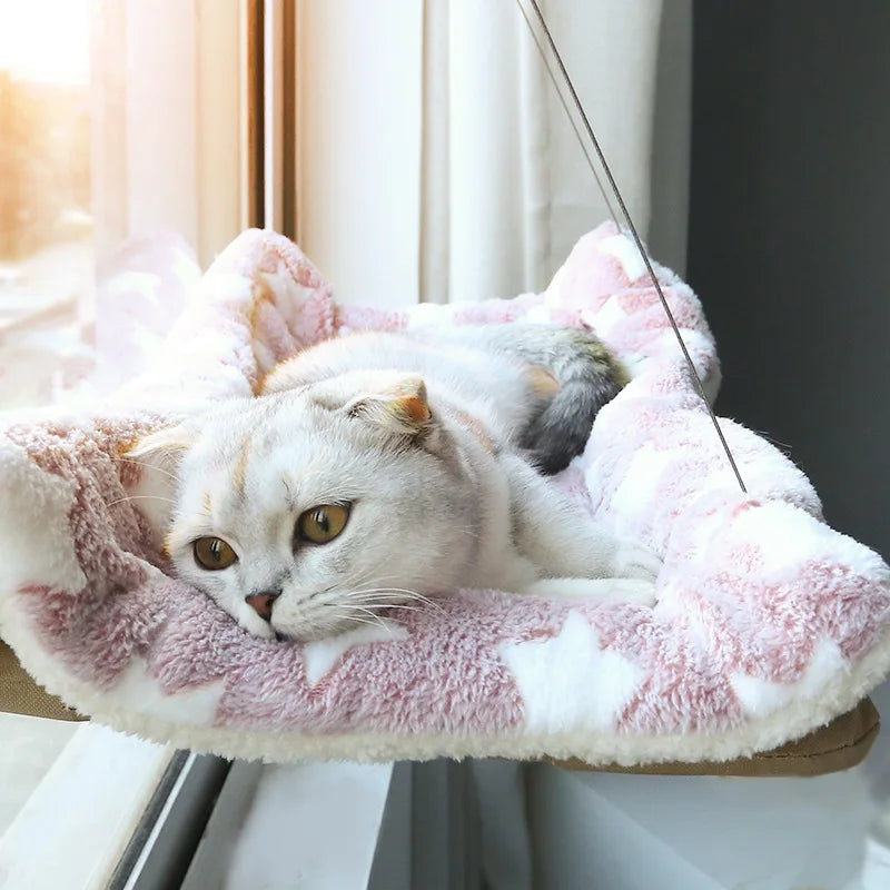 Cat Window Mounted Perch HammockThe Cat Window Mounted Perch Hammock provides a secure and comfortable spot for your cat to relax and observe their surroundings. With its convenient window mount, yCat Window Mounted Perch Hammock