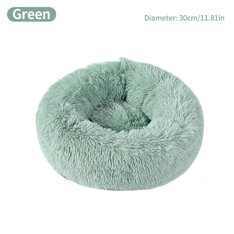 Calming Pet BedDONUT PET BED; 23in round dog bed for pets up to 25lbs; this includes breeds such as small Terriers, Daschund, Pomeranian, Shi Tzu, Pug, Chihuahua, all Toy Breeds et0Calming Pet Bed