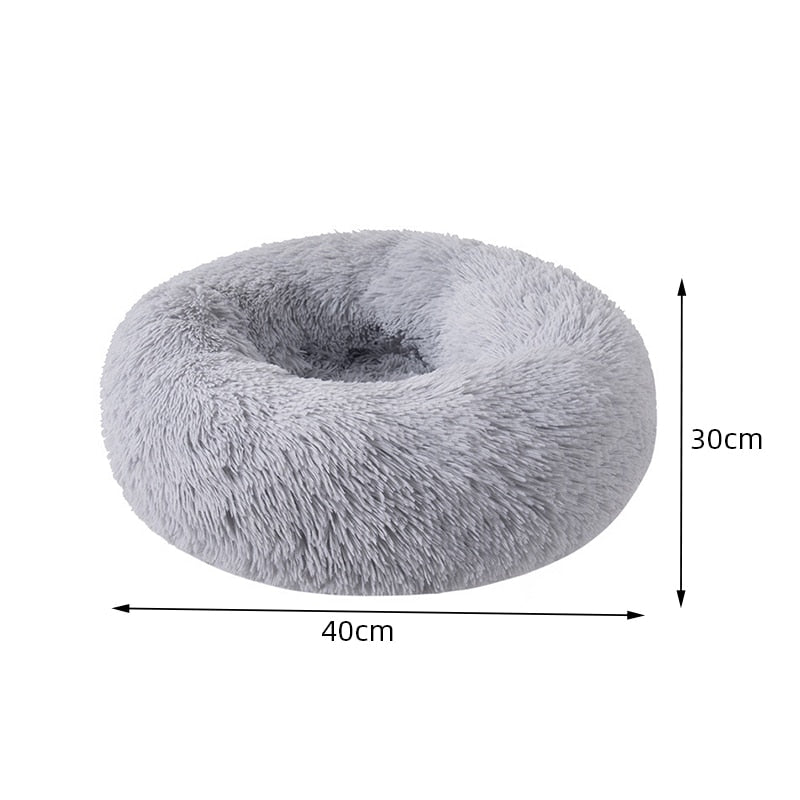 Calming Pet BedDONUT PET BED; 23in round dog bed for pets up to 25lbs; this includes breeds such as small Terriers, Daschund, Pomeranian, Shi Tzu, Pug, Chihuahua, all Toy Breeds et0Calming Pet Bed