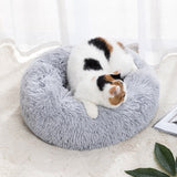 Calming Pet BedDONUT PET BED; 23in round dog bed for pets up to 25lbs; this includes breeds such as small Terriers, Daschund, Pomeranian, Shi Tzu, Pug, Chihuahua, all Toy Breeds et0Calming Pet Bed