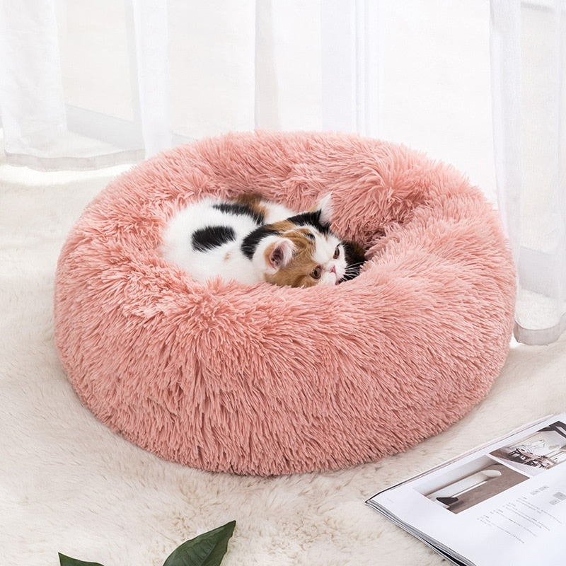 Calming Pet BedDONUT PET BED; 23in round dog bed for pets up to 25lbs; this includes breeds such as small Terriers, Daschund, Pomeranian, Shi Tzu, Pug, Chihuahua, all Toy Breeds et0Calming Pet Bed